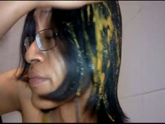 Nerdy man uses his wet poop as his shampoo